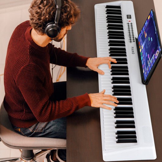 Costway 88 Key Foldable Electric Keyboard Piano with Wireless MIDI and Dual Speakers White - Galactic capuchin